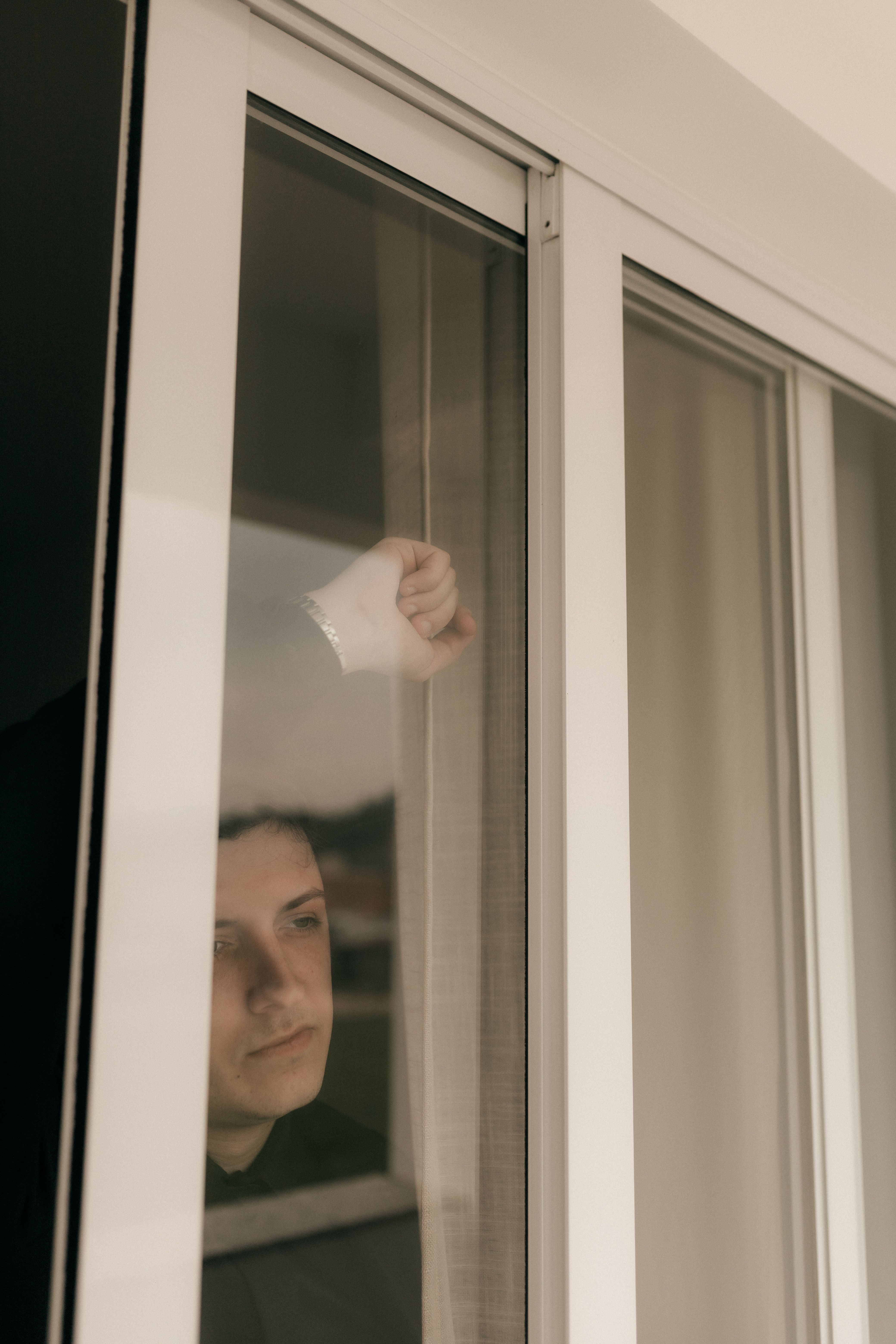 A young adult in a quiet moment of reflection